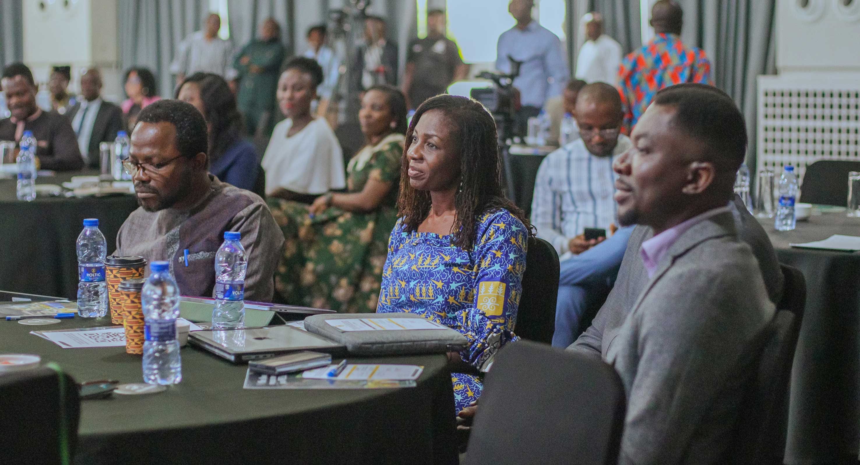 (Left–right): Prof. Fred Mawunyo Dzanku, Prof. Ama Pokuaa Fenny, Dr. Ralph Armah and Dr. Kwame Adjei Mantey follow proceedings as Prof. Robert Darko Osei presents ISSER’s analysis on Ghana’s economic performance.