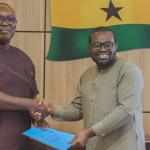 ISSER Director, Prof. Robert Darko Osei, and NCA Director-General, Rev. Eng. Edmund Y. Fianko, in a handshake following the signing of the Memorandum of Understanding.